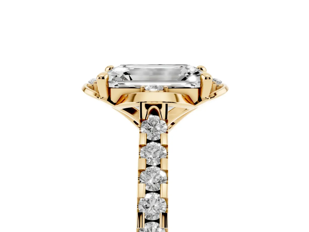Emerald Cut Diamond Ring with Pavé Band and Floral Prong Setting Yellow gold