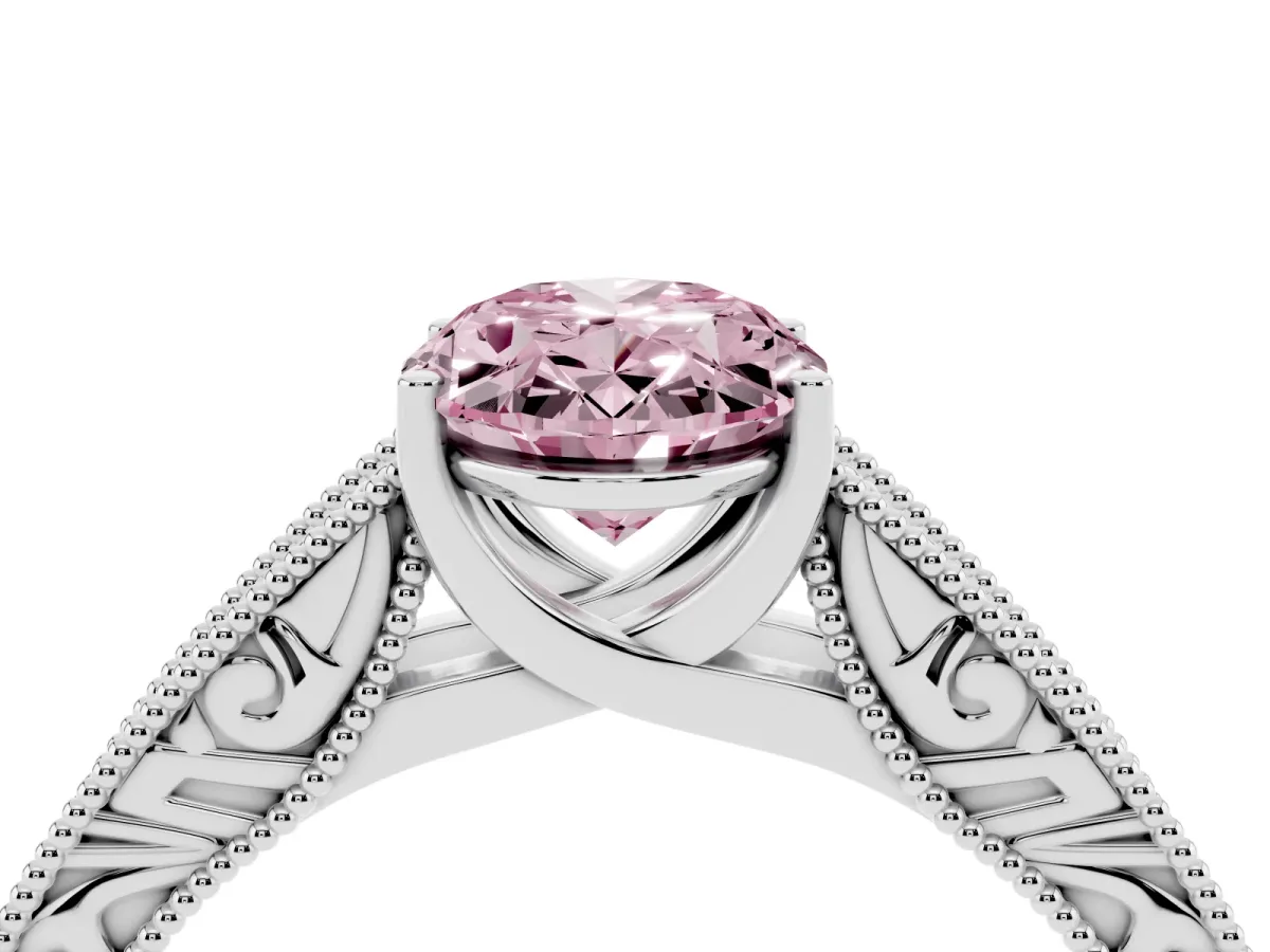 Fancy Pink Oval Cut Diamond Solitaire Ring with Engraved Band and Four-Prong Setting Silver