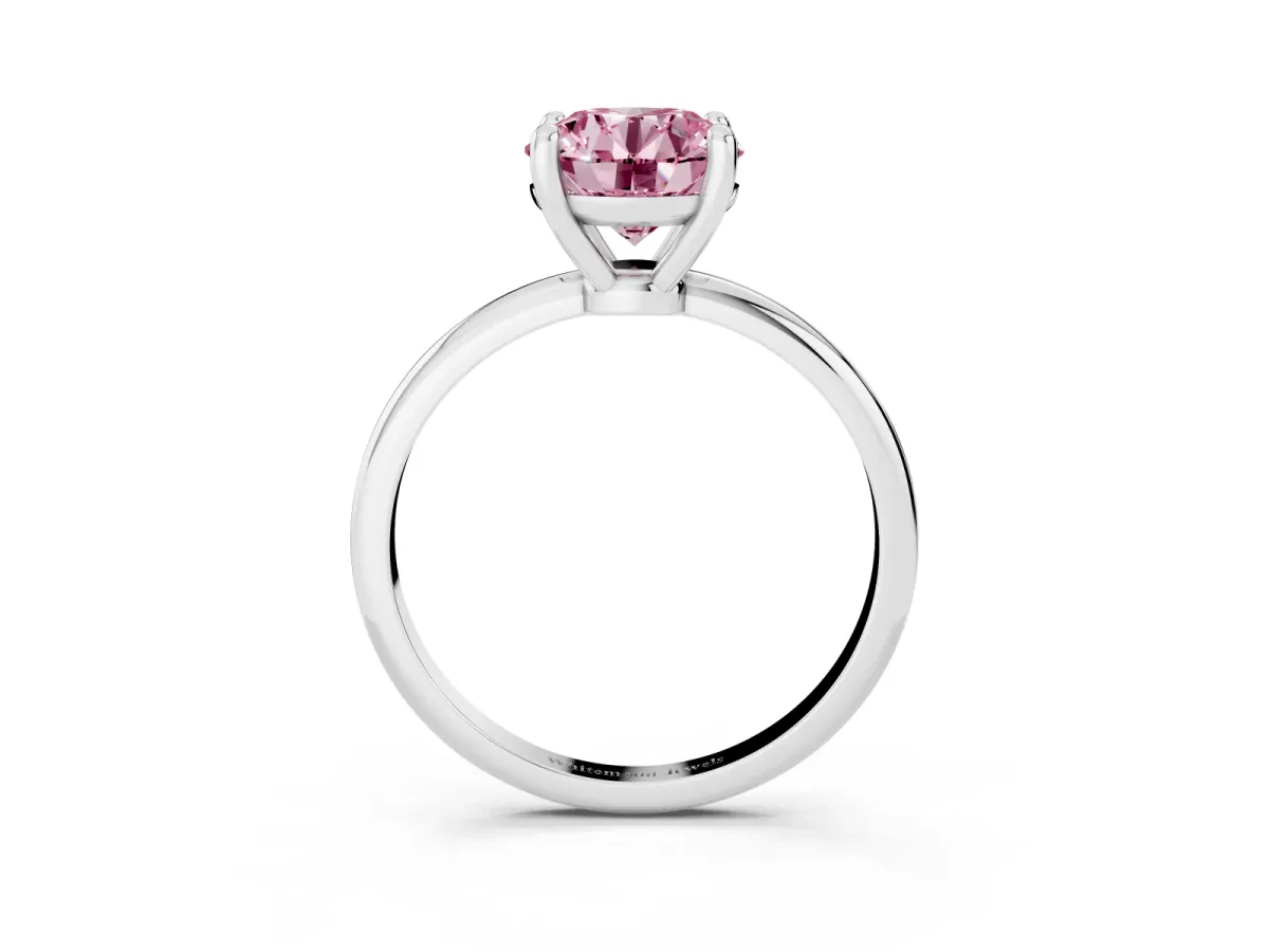 Fancy Pink Round Cut Solitaire Diamond Ring with 4-Prong Setting on a Classic Band Platinum
