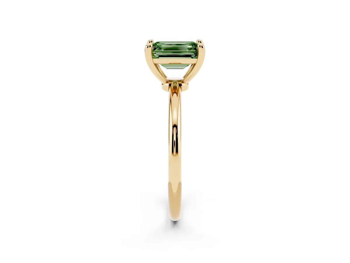 Fancy Green Emerald Cut Solitaire Diamond Ring with 4-Prong Setting on a Classic Band Yellow gold