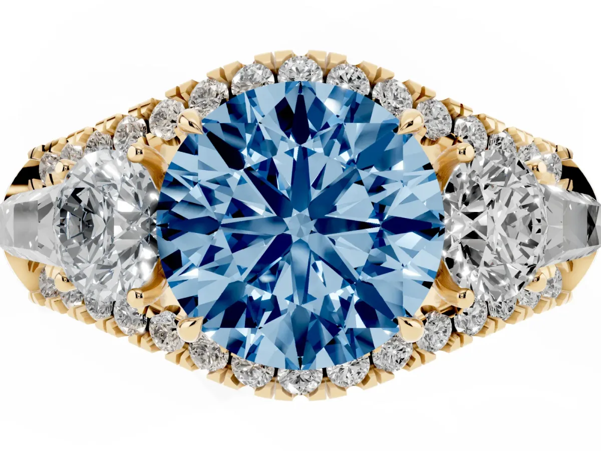 Fancy Blue Three-Stone Round Cut Diamond Engagement Ring with Pave Band and Prong Setting Yellow gold