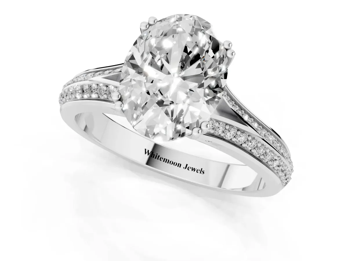 Oval Cut Diamond Split Shank Engagement Ring with Pavé Band White gold