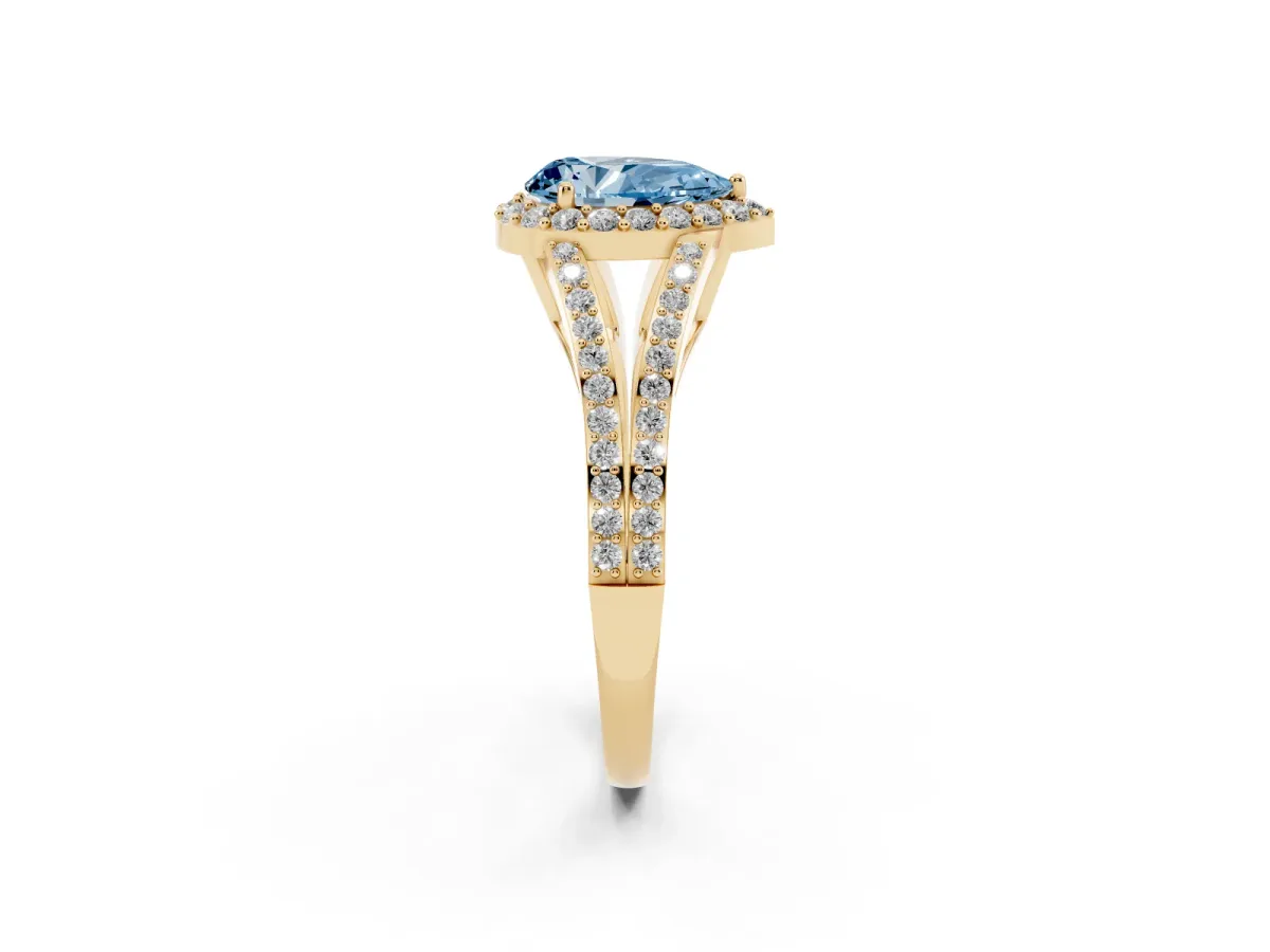 Fancy Blue Pear Cut Halo Split Shank Diamond Ring with Prong Setting Yellow gold