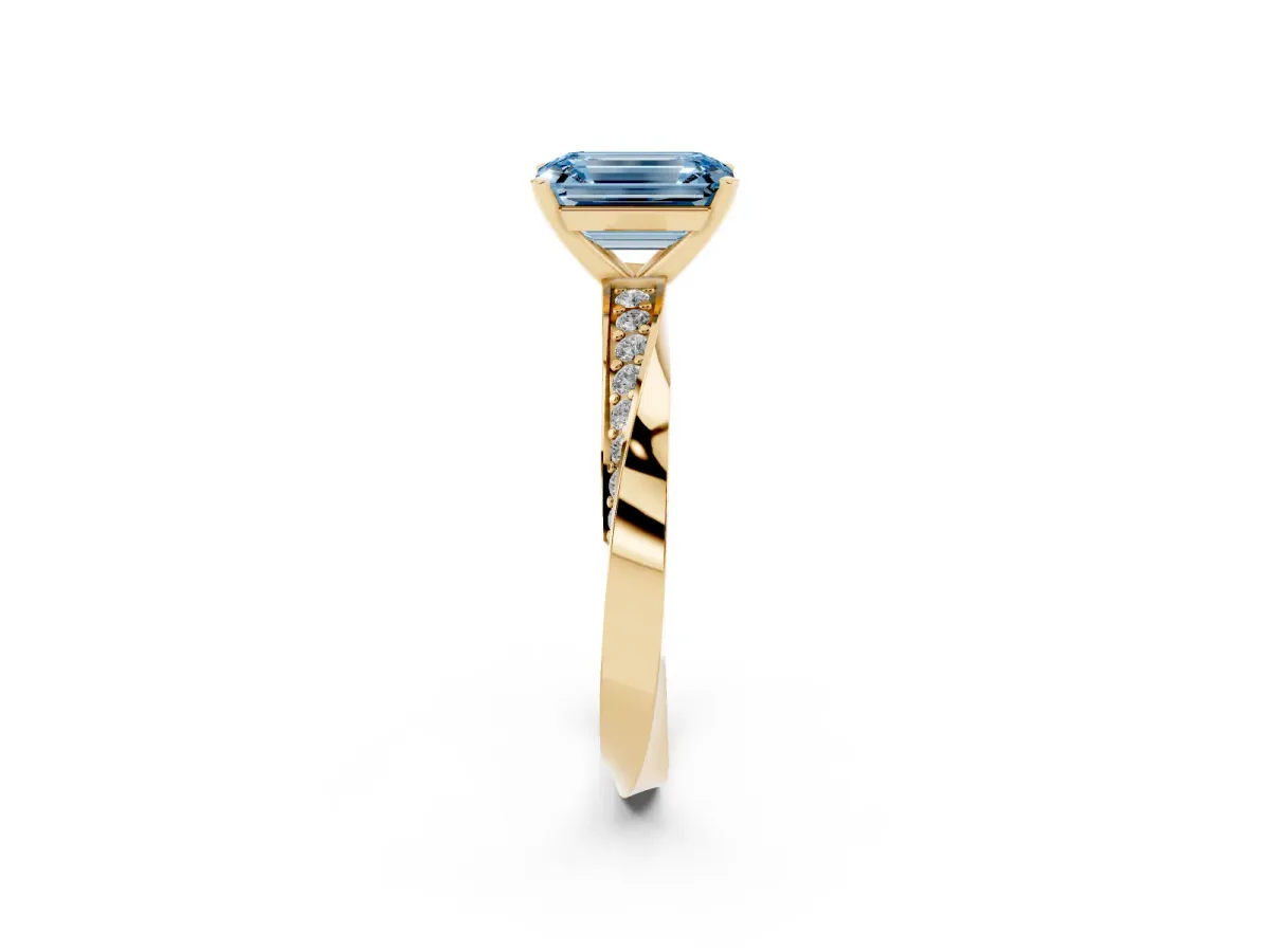 Fancy Blue Emerald Cut Diamond Engagement Ring with Side Stone Accents and Four-Prong Setting Yellow gold