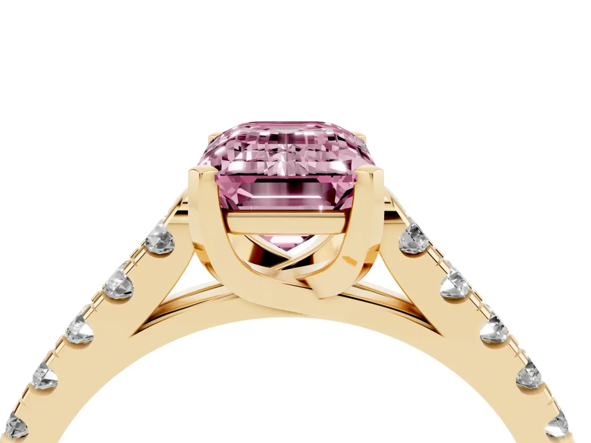 Fancy Pink Emerald Cut Diamond Pavé Band Solitaire Ring with Prong Setting Yellow gold
