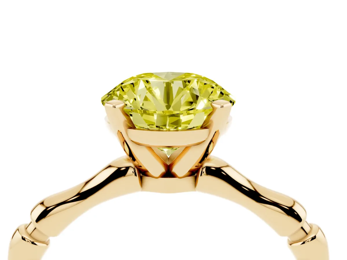 Fancy Yellow Round Cut Solitaire Diamond Ring with Bamboo Band and Four-Prong Setting Yellow gold