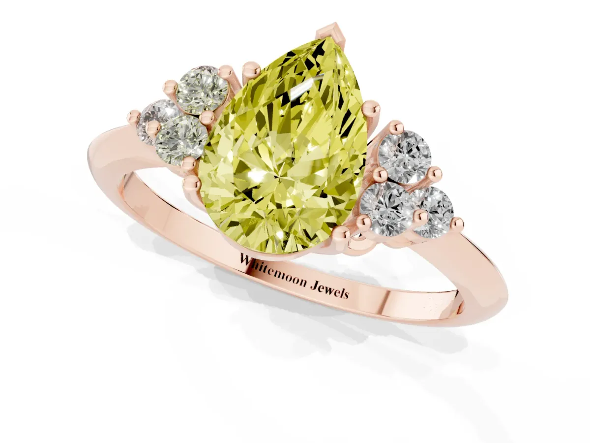 Fancy Yellow Pear Cut Cut Diamond Cluster Ring with Solitaire Band and Four-Prong Setting Rose gold