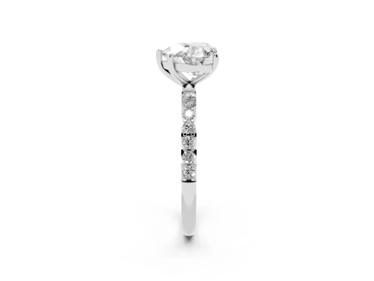 Heart Cut Diamond Solitaire Ring with Round Pavé Shoulders and Prong Setting Silver
