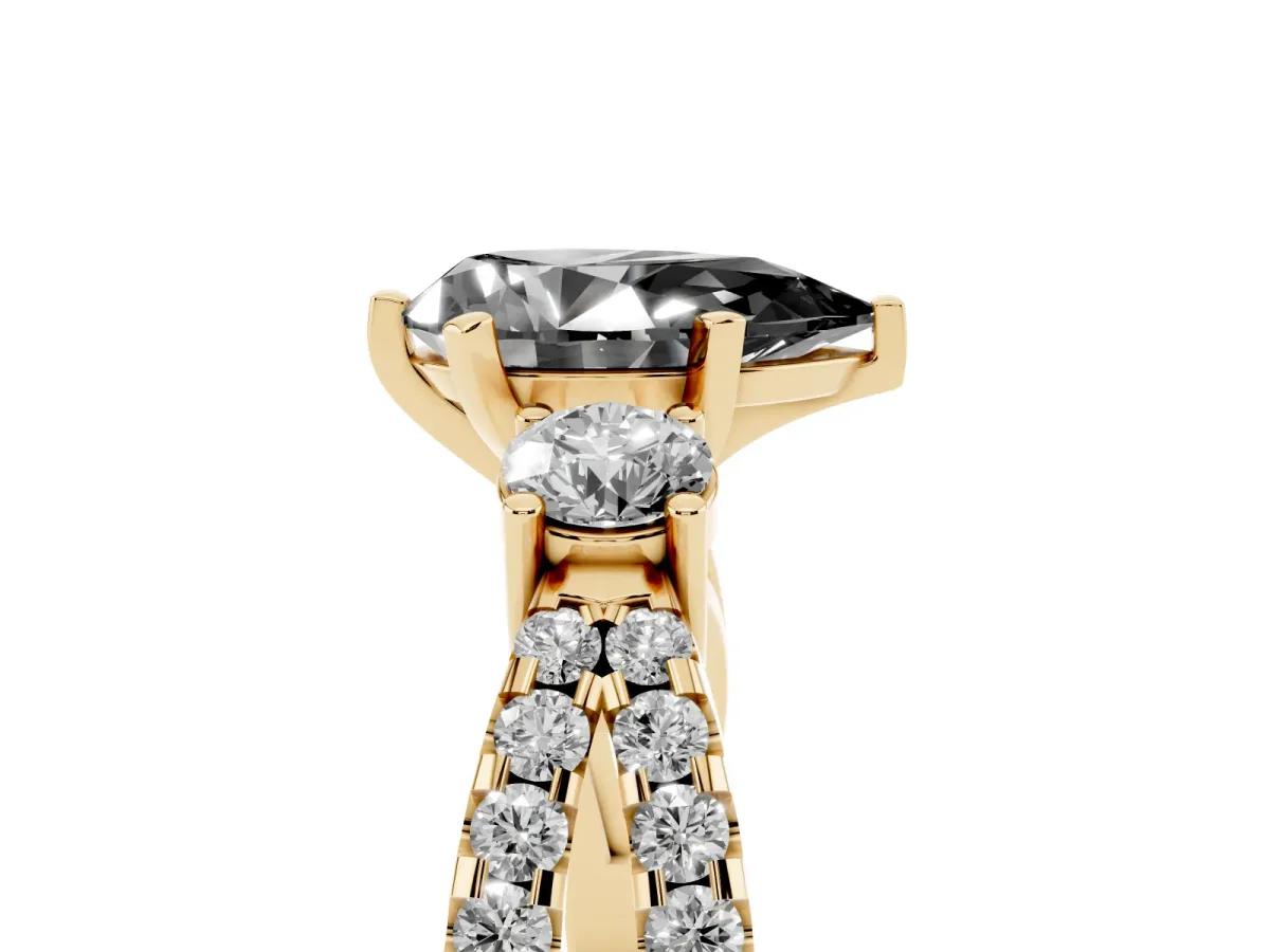 Fancy Black Pear Cut Diamond Three-Stone Ring with Pavé Split Shank and Four-Prong Setting Yellow gold