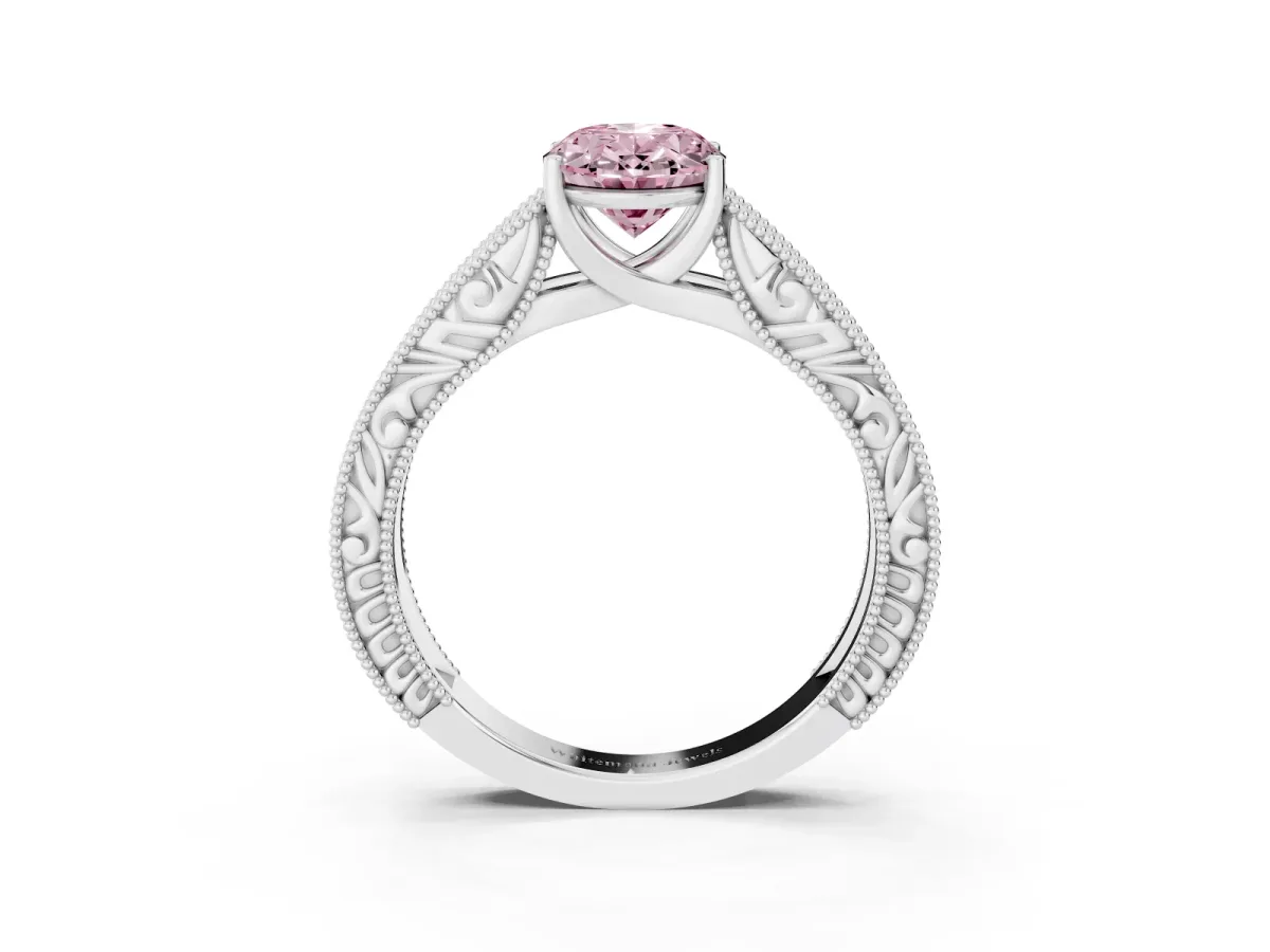 Fancy Pink Oval Cut Diamond Solitaire Ring with Engraved Band and Four-Prong Setting Silver