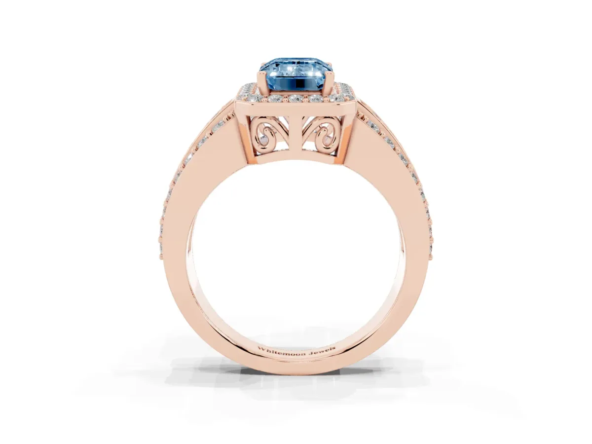 Fancy Blue Emerald Cut Halo Diamond Ring with Round Split Shank and Prong Setting Rose gold