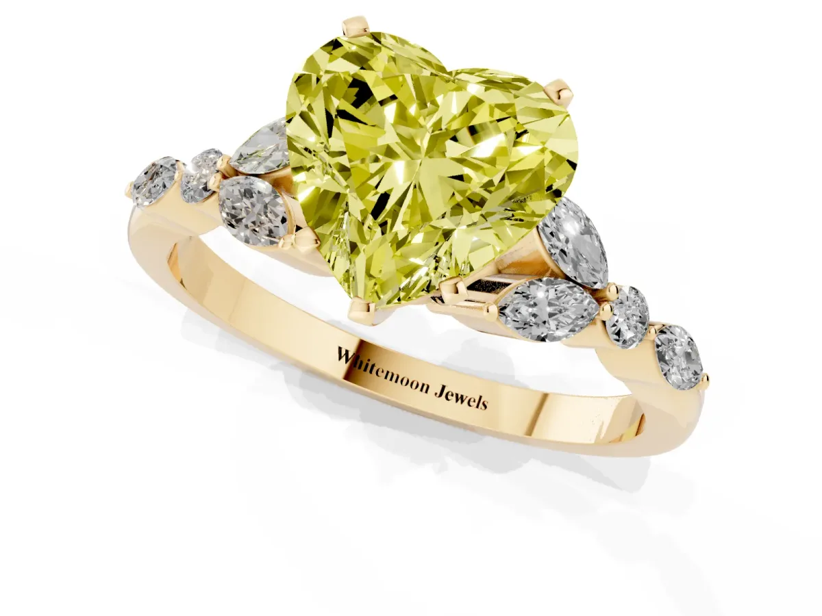Fancy Yellow Heart Cut Diamond Solitaire Ring with Side Stones and Four-Prong Setting Yellow gold