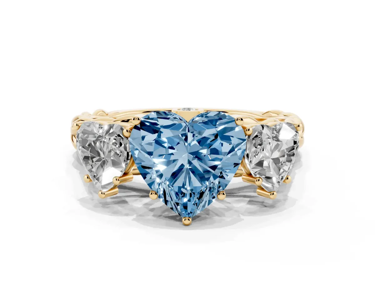 Fancy Blue Three-Stone Heart Cut Diamond Braided Band Ring with Four-Prong Setting Yellow gold