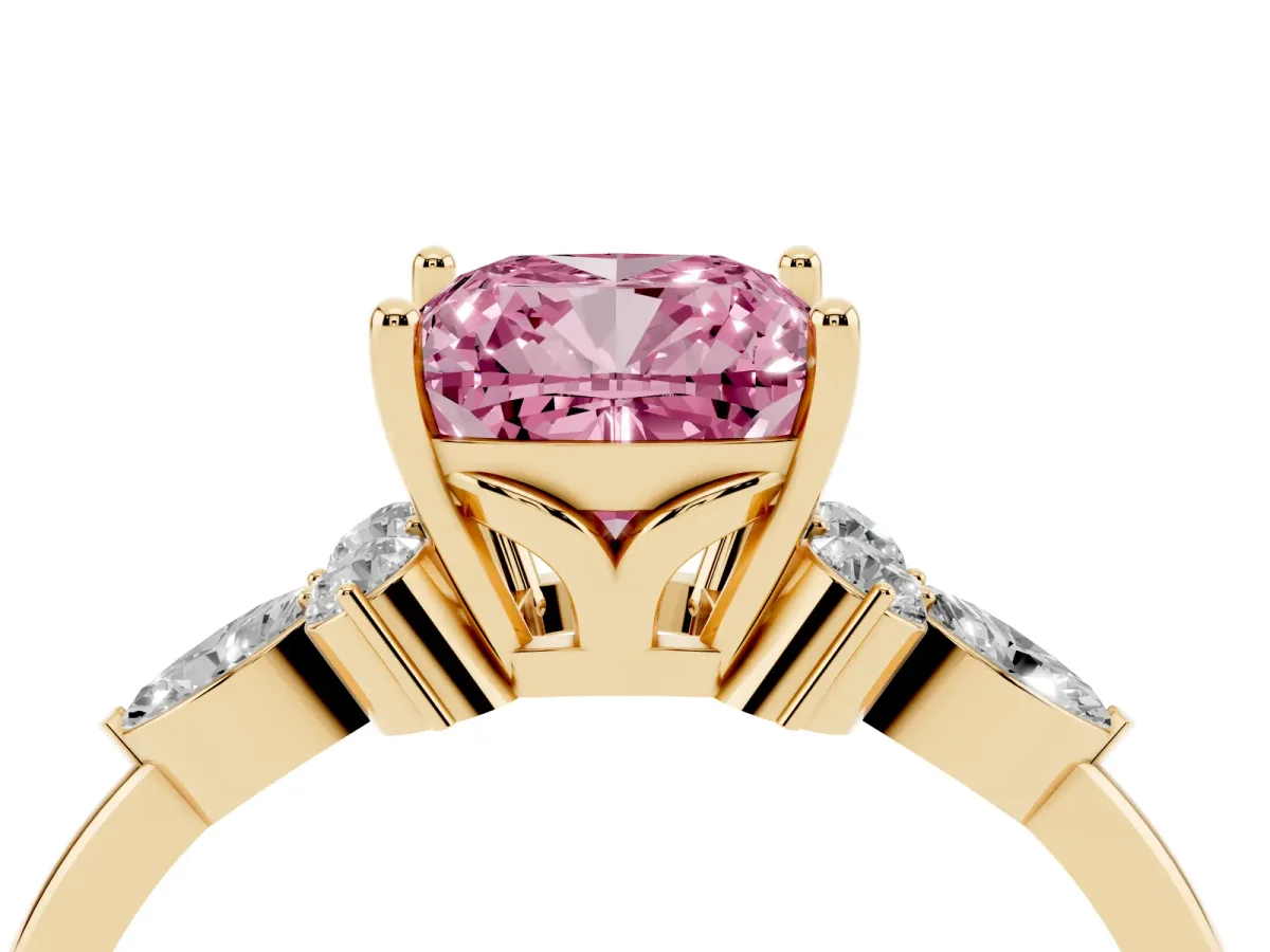 Fancy Pink Cushion Cut Brilliant Diamond Solitaire Ring with Pear Side Stones and Four-Prong Setting Yellow gold