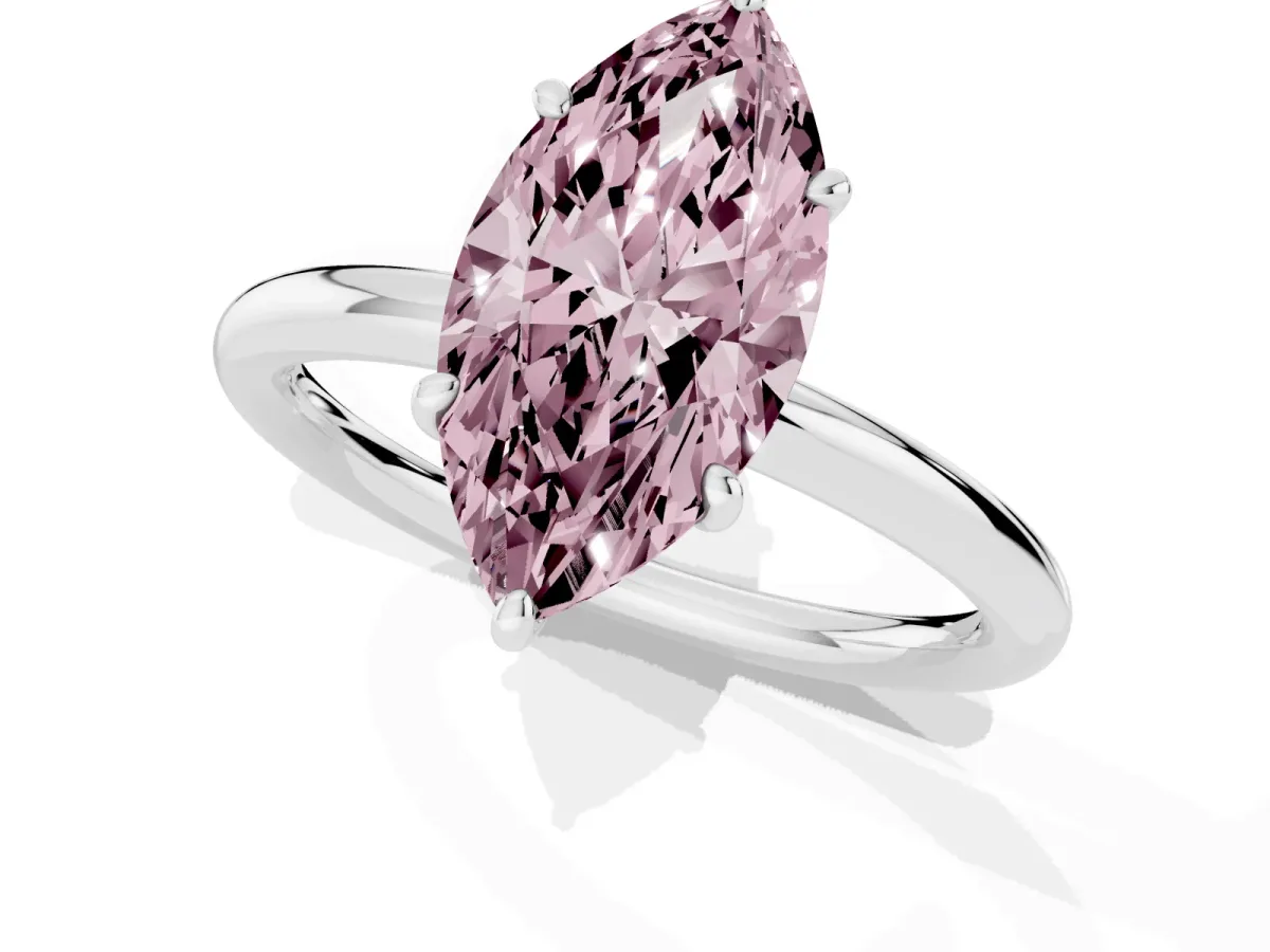 Fancy Pink Marquise Cut Solitaire Diamond Ring with Four-Prong Setting on a Plain Band Silver