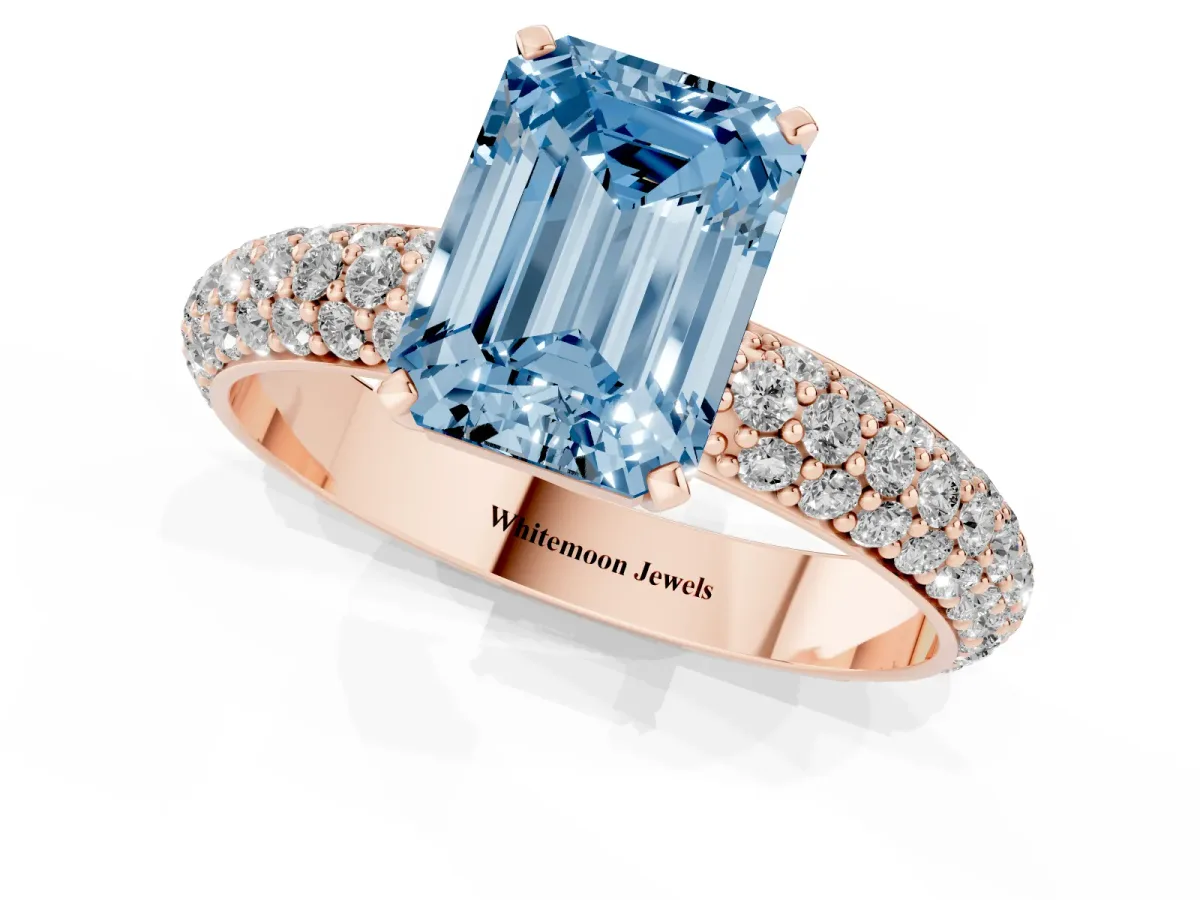 Fancy Blue Emerald Cut Diamond Solitaire Ring with Prong Setting and Pavé Band Rose gold