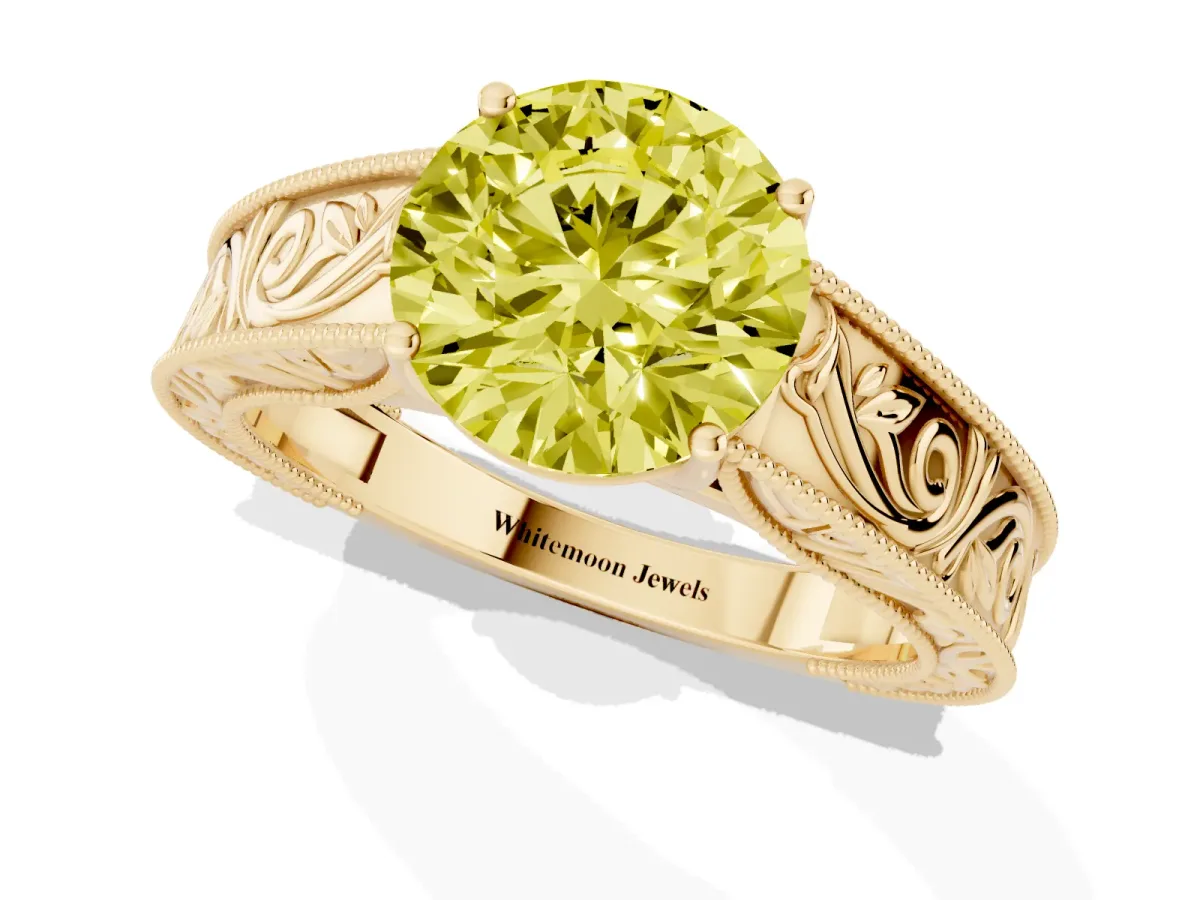 Fancy Yellow Round Cut Diamond Solitaire Ring with Engraved Band and Four-Prong Setting Yellow gold