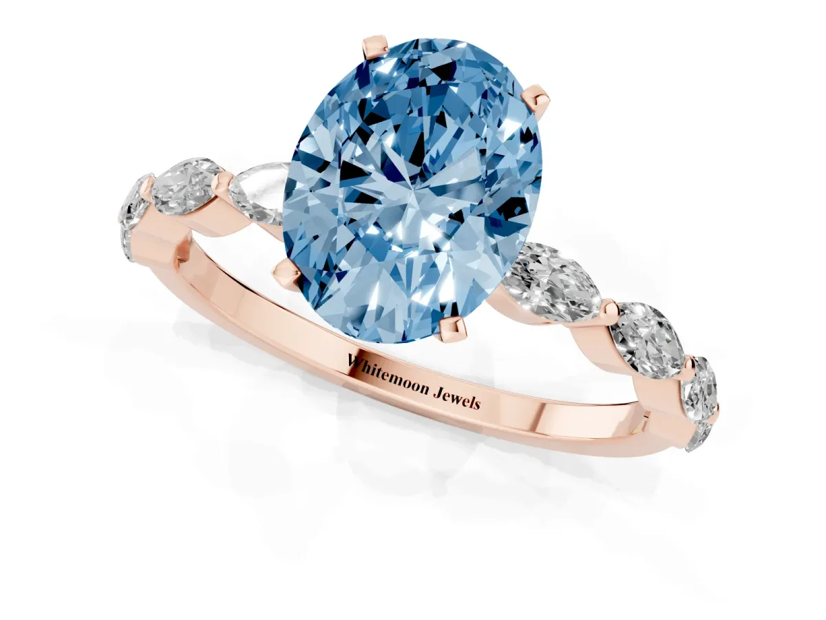 Fancy Blue Oval Cut Diamond Ring with Marquise Side Stones and Prong Setting Rose gold