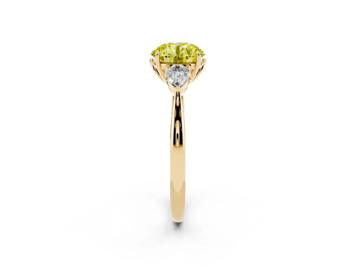 Fancy Yellow Three-Stone Round Cut Brilliant Diamond Solitaire Ring with Tapered Band and Four-Prong Setting Yellow gold