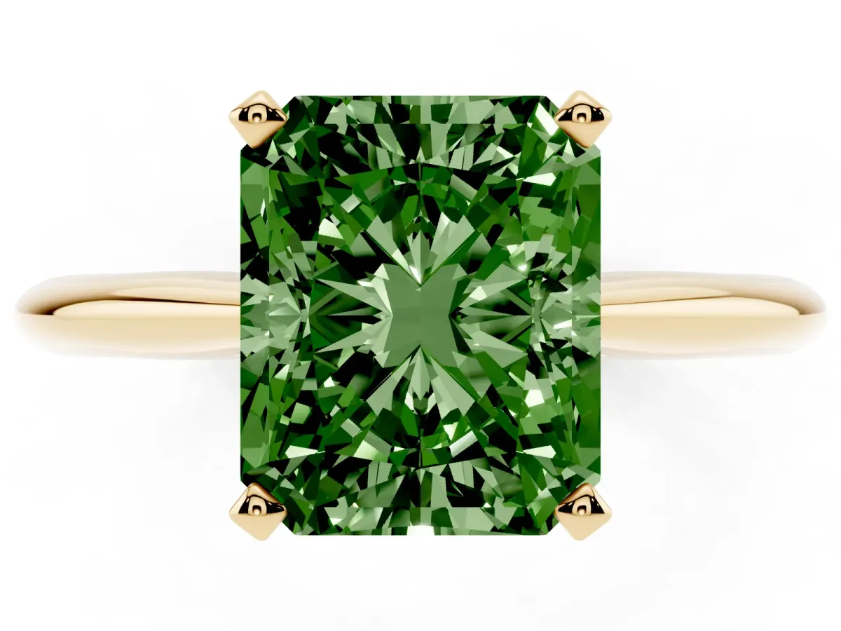Fancy Green Radiant Cut Cut Solitaire Ring with Four-Prong Setting on a Classic Band Yellow gold