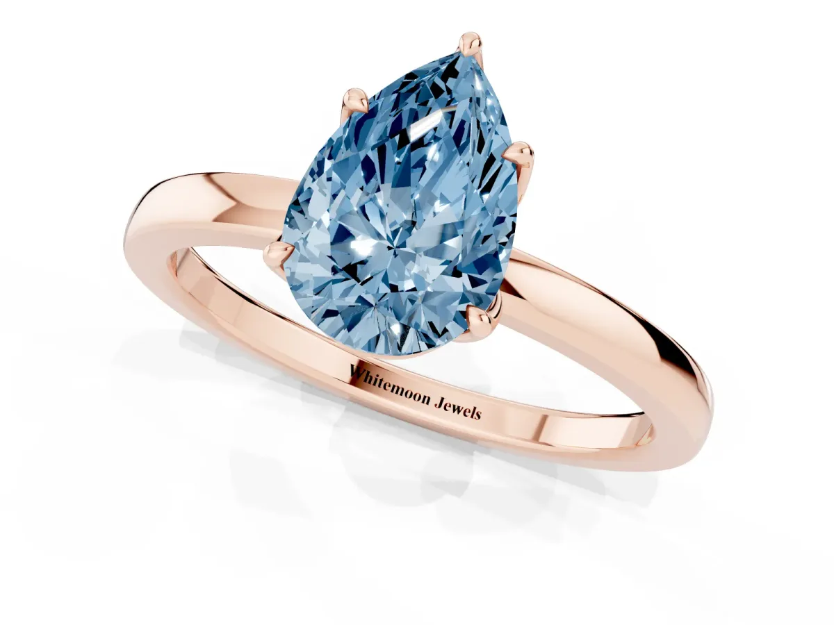 Fancy Blue Pear Cut Diamond Solitaire Ring with Thin Band and Prong Setting Rose gold