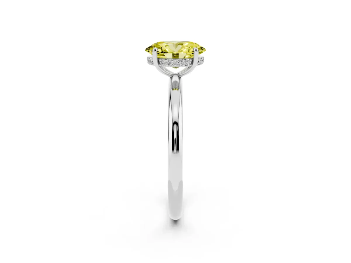 Fancy Yellow Oval Cut Diamond Solitaire Ring with Thin Band and Four-Prong Setting Silver