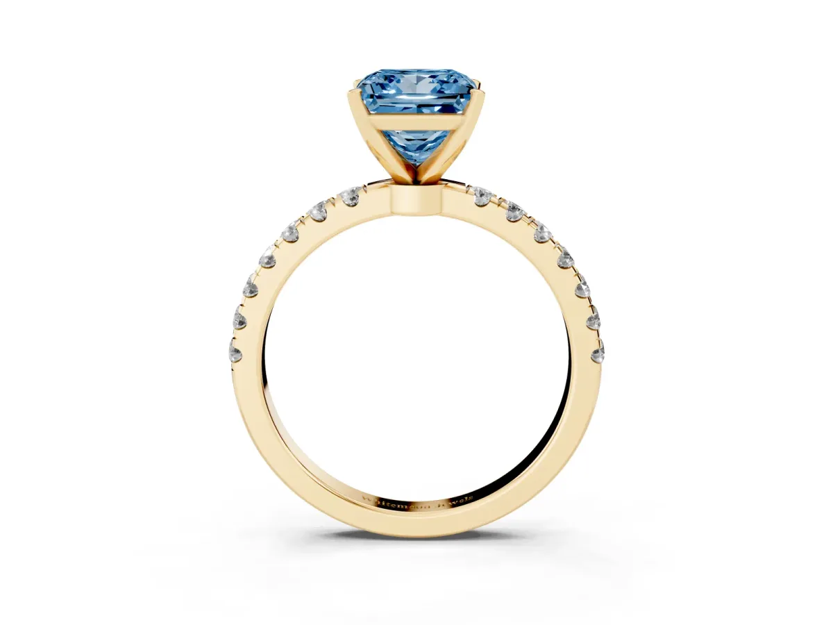Fancy Blue Princess Cut Diamond Solitaire Ring with Pavé Accents and Four-Prong Setting Yellow gold