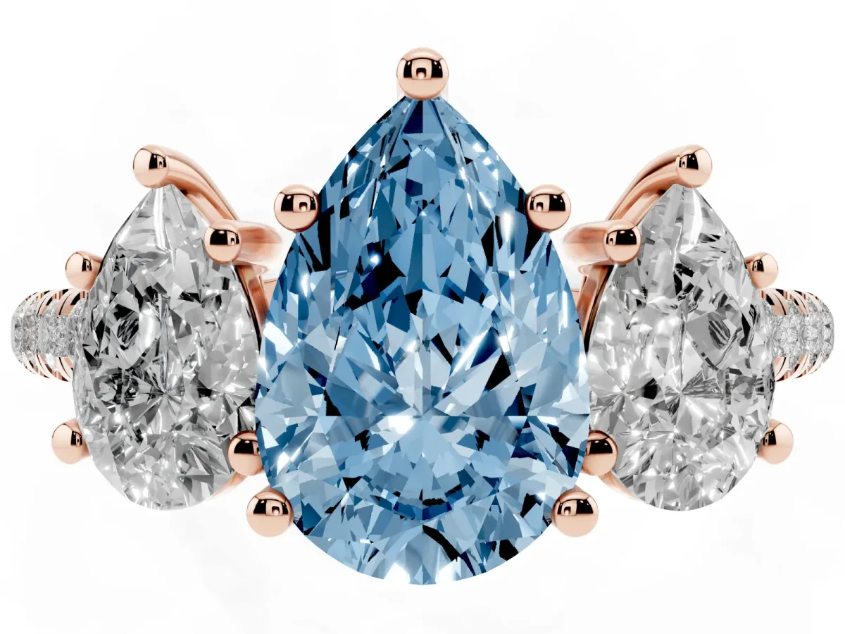 Fancy Blue Three-Stone Pear Cut Diamond Ring with Round Pavé Band and Prong Setting Rose gold