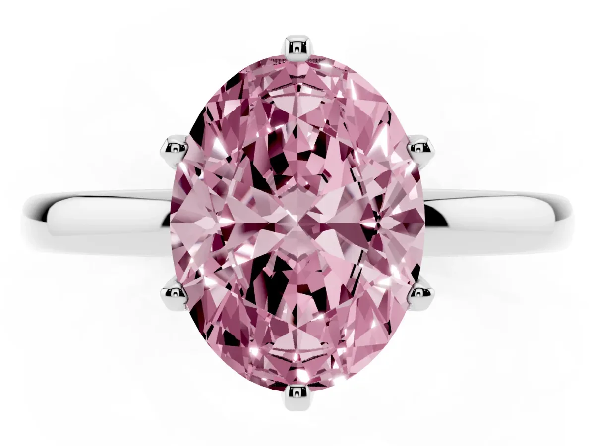 Fancy Pink Oval Cut Solitaire Diamond Ring with Six-Prong Setting on a Classic Band Silver