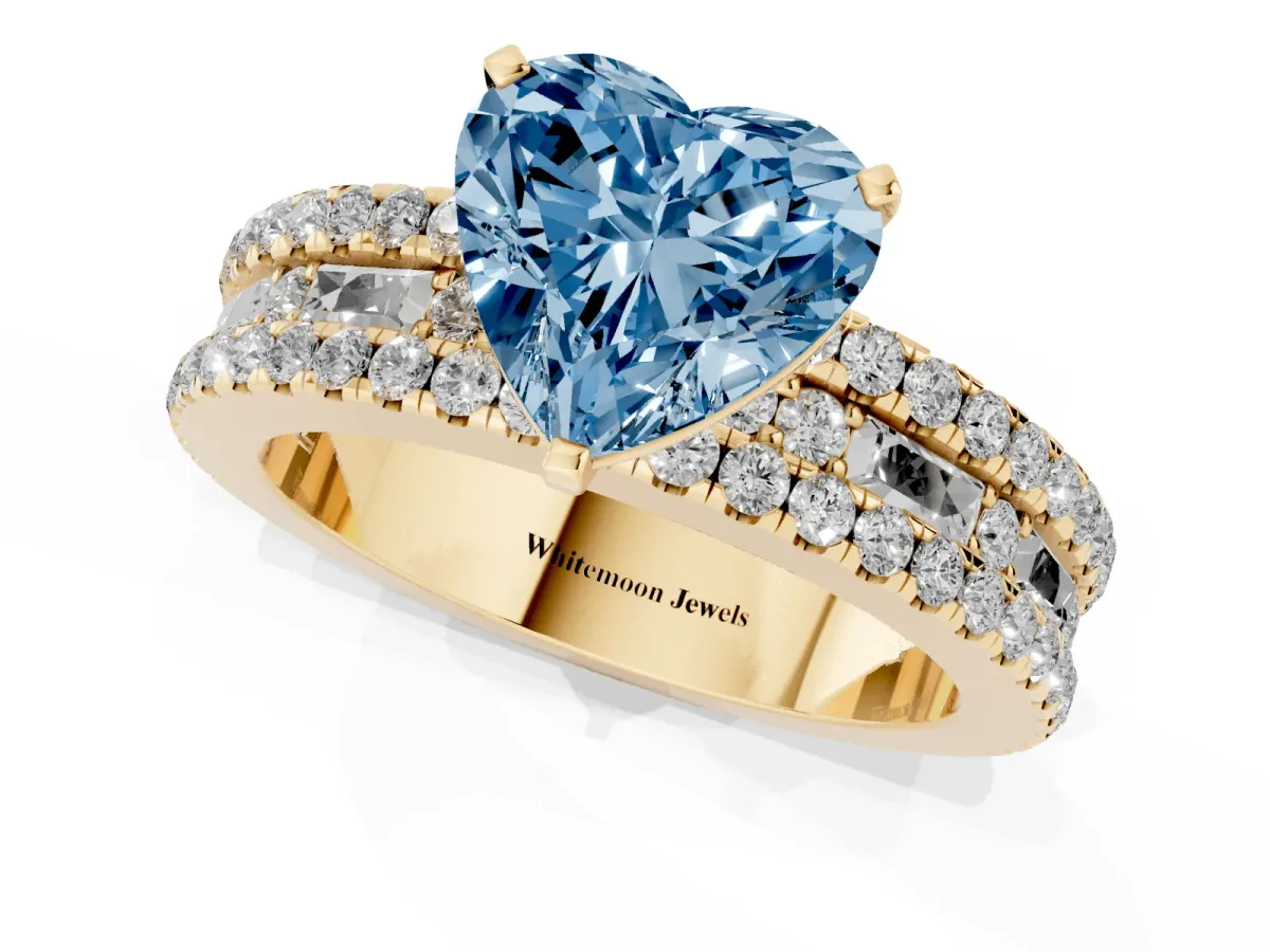Fancy Blue Heart Cut Diamond Solitaire Ring with Pavé and Channel Set Band Yellow gold