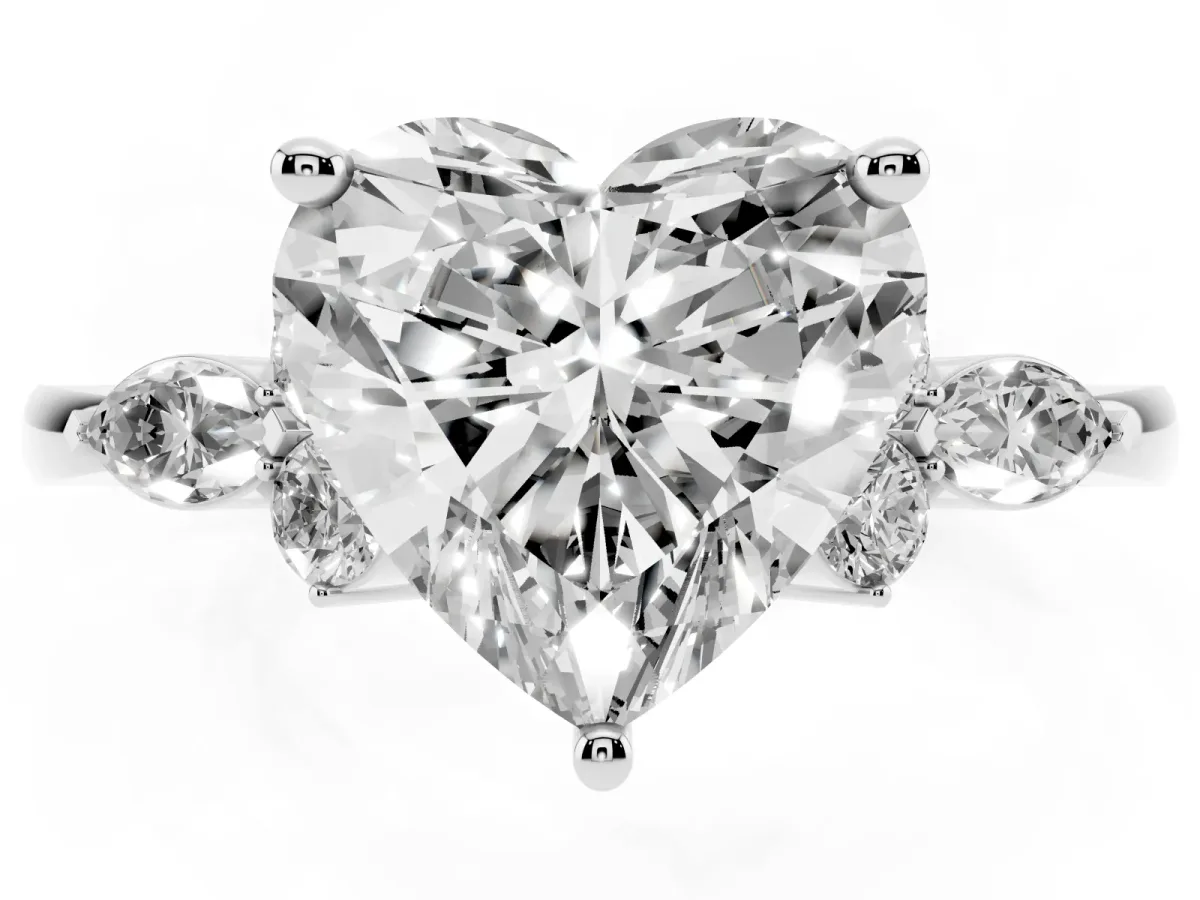 Heart Cut Brilliant Diamond Solitaire Ring with Pear Side Stones and Four-Prong Setting Platinum