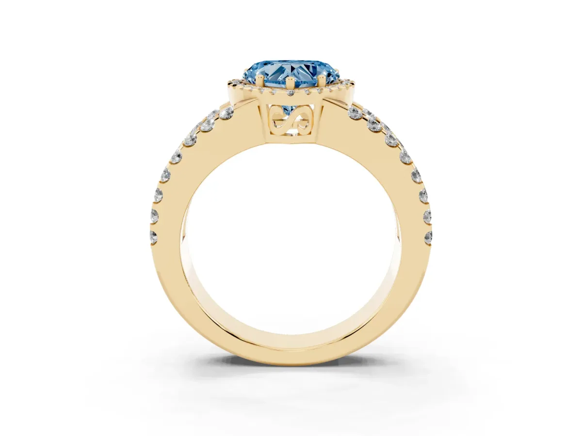 Fancy Blue Heart Cut Cut Halo Split Shank Diamond Ring with Four-Prong Setting Yellow gold