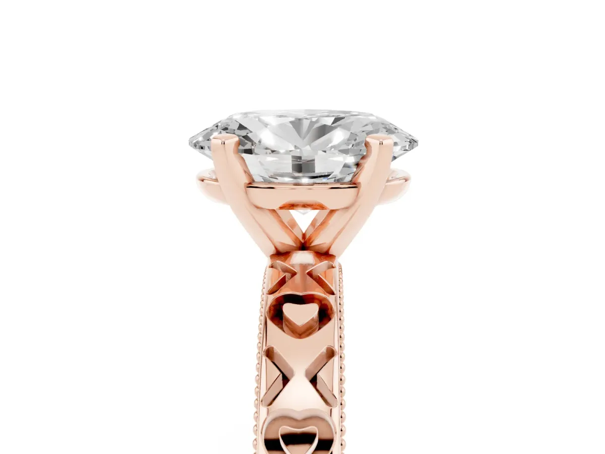 Oval Cut Solitaire Diamond Engagement Ring with XO Engraved Band and Four-Prong Setting Rose gold