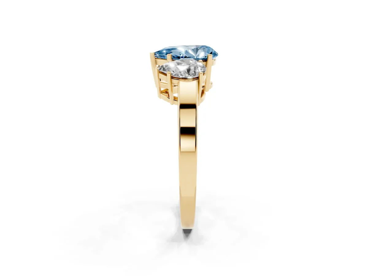 Fancy Blue Three-Stone Pear Cut Cut Diamond Engagement Ring with Flat Band and Four-Prong Setting Yellow gold