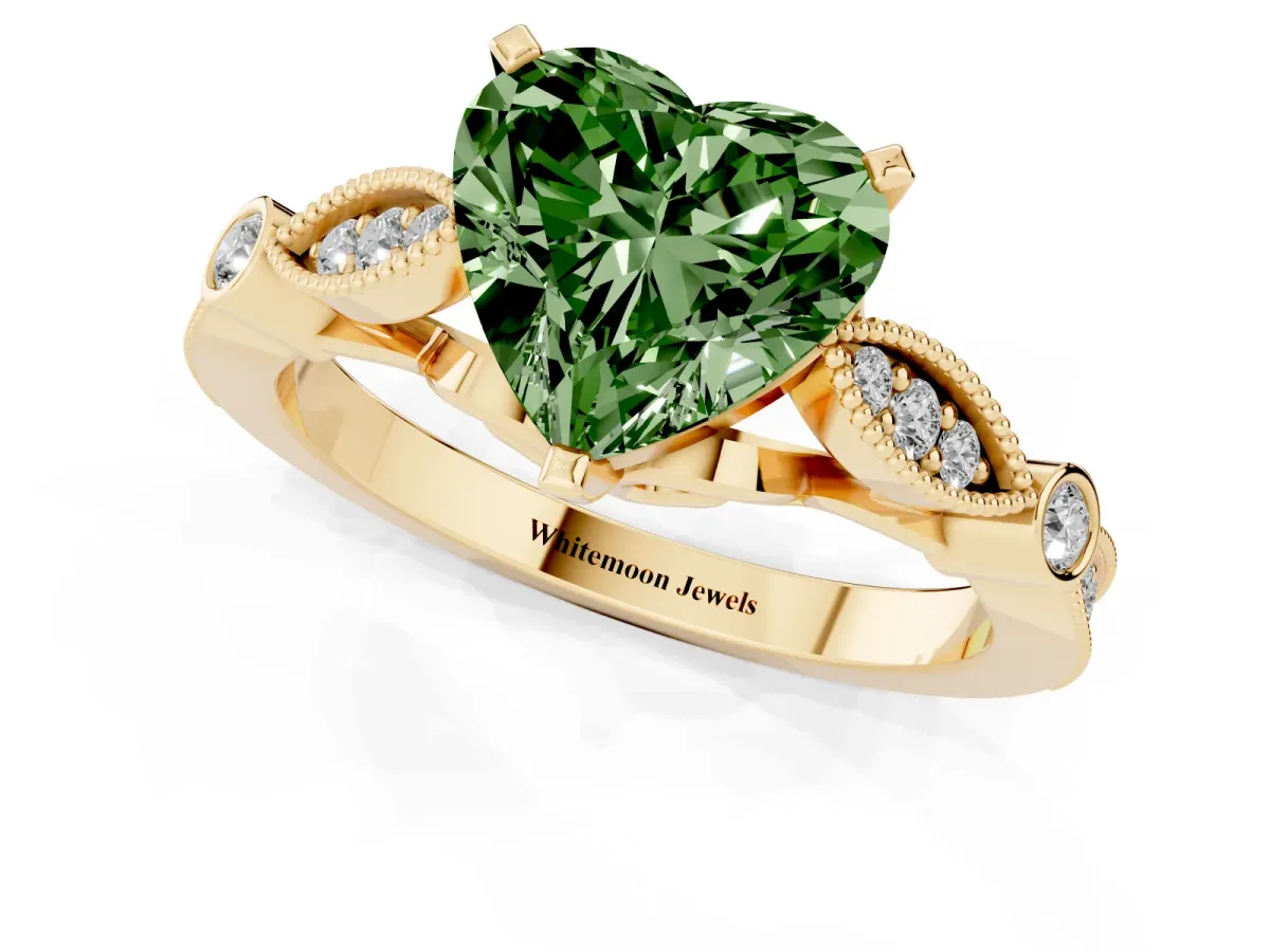 Fancy Green Heart Cut Cut Diamond with Milgrain Marquise and Bezel Accents on a Solitaire Band with Prong Setting Yellow gold