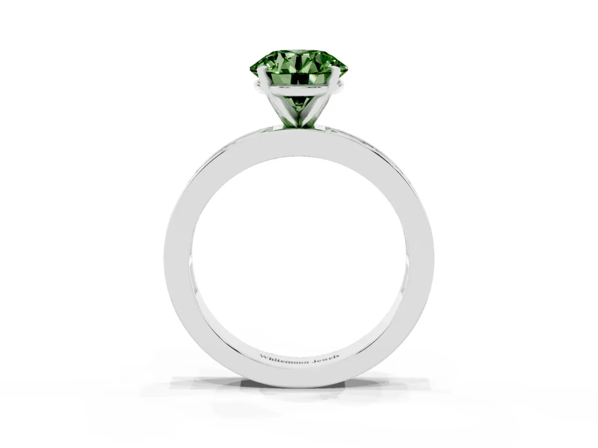 Fancy Green Round Cut Solitaire Diamond Ring with Channel-Set Baguette Band and Four-Prong Setting White gold