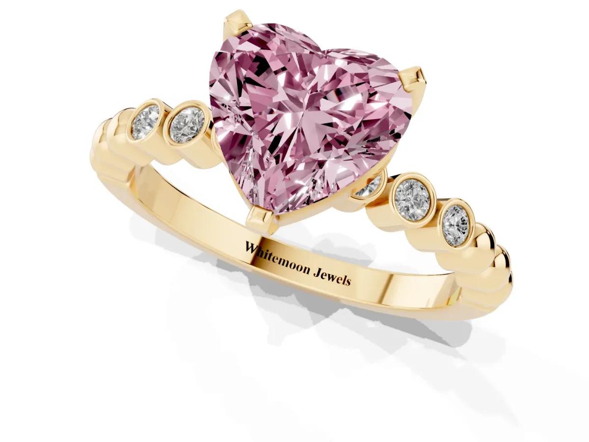 Fancy Pink Heart Cut Solitaire Bezel Accent Diamond Engagement Ring with Beaded Band and Four-Prong Setting Yellow gold