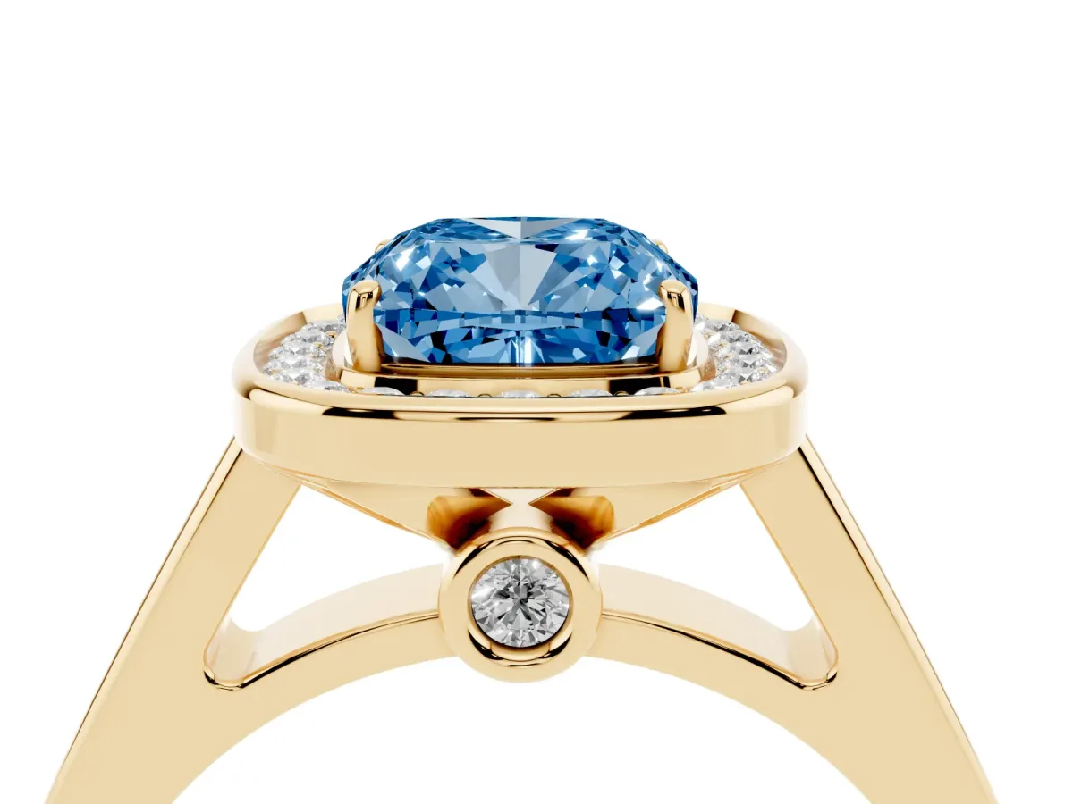 Fancy Blue Cushion Cut Halo Solitaire Diamond Ring with Pave Band and Bezel Setting Yellow gold