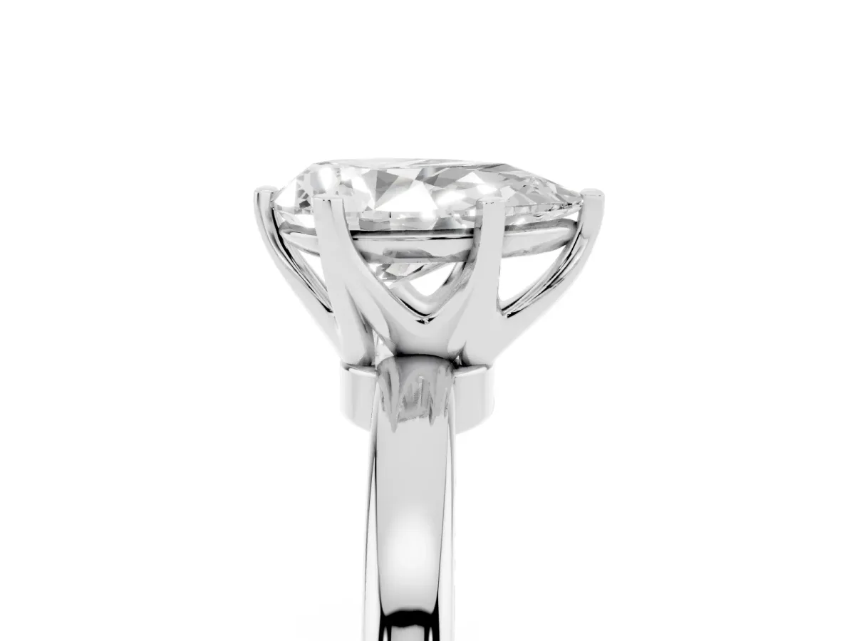 Pear Cut Solitaire Diamond Ring with Six-Prong Setting on a Classic Band Platinum