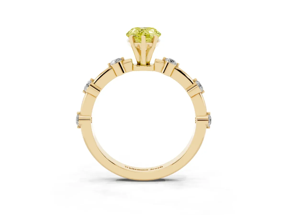 Fancy Yellow Pear Cut Solitaire Diamond Ring with Bezel Set Side Stones and Prong Setting Yellow gold