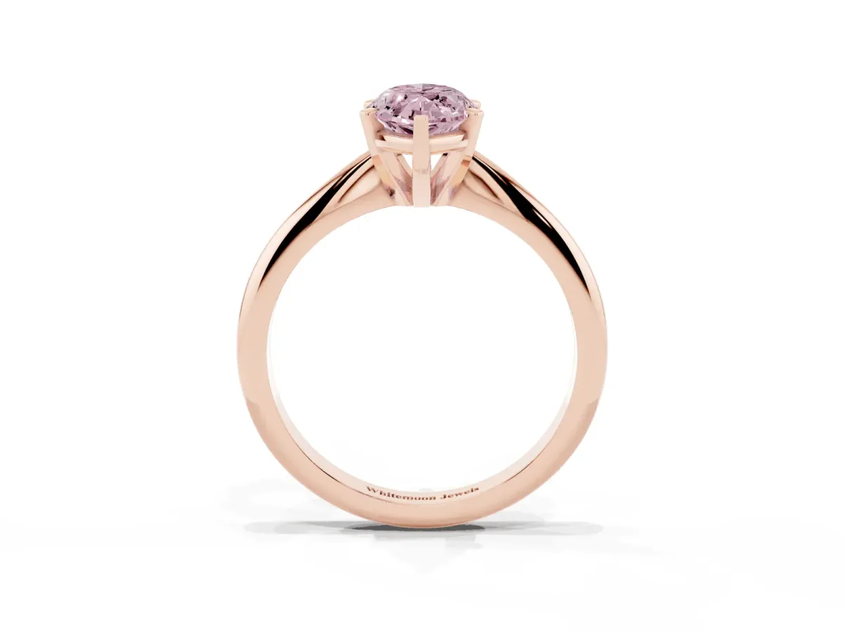 Fancy Pink Marquise Cut Cut Solitaire Ring with Four-Prong Setting on a Classic Band Rose gold