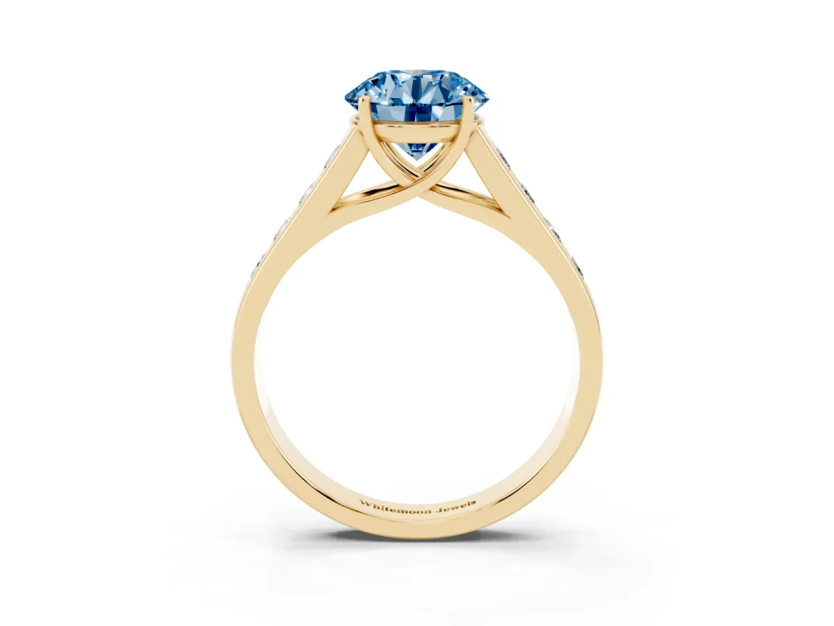 Fancy Blue Round Cut Brilliant Channel-Set Solitaire Ring with Four-Prong Setting Yellow gold