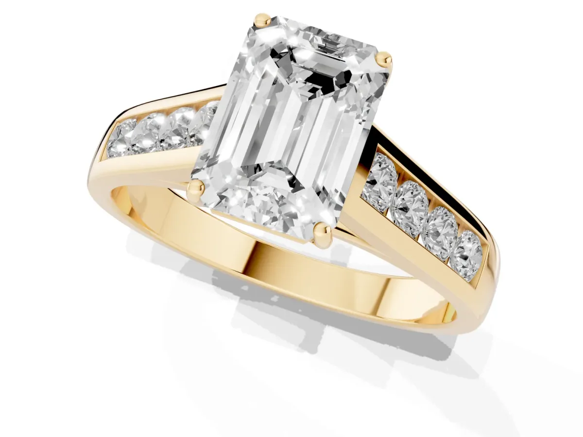 Emerald Cut Brilliant Channel-Set Solitaire Ring with Four-Prong Setting Yellow gold