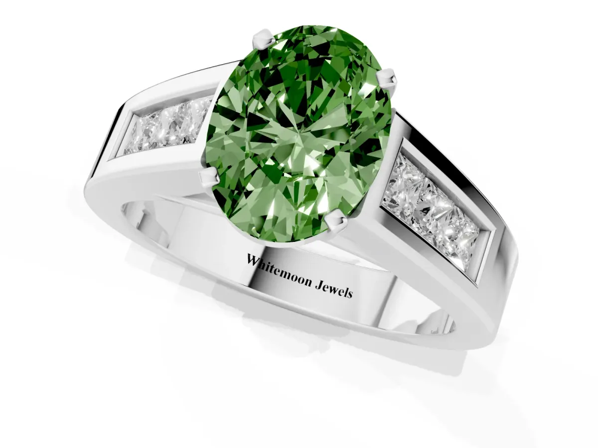 Fancy Green Oval Cut Cut Channel Set Solitaire Ring with Four-Prong Setting Silver