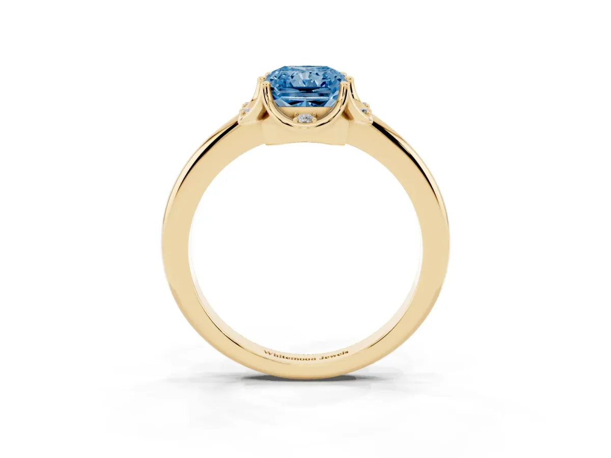 Fancy Blue Radiant Cut Halo Diamond Ring with Round Cluster Setting, Solitaire Band, and Four-Prong Setting Yellow gold