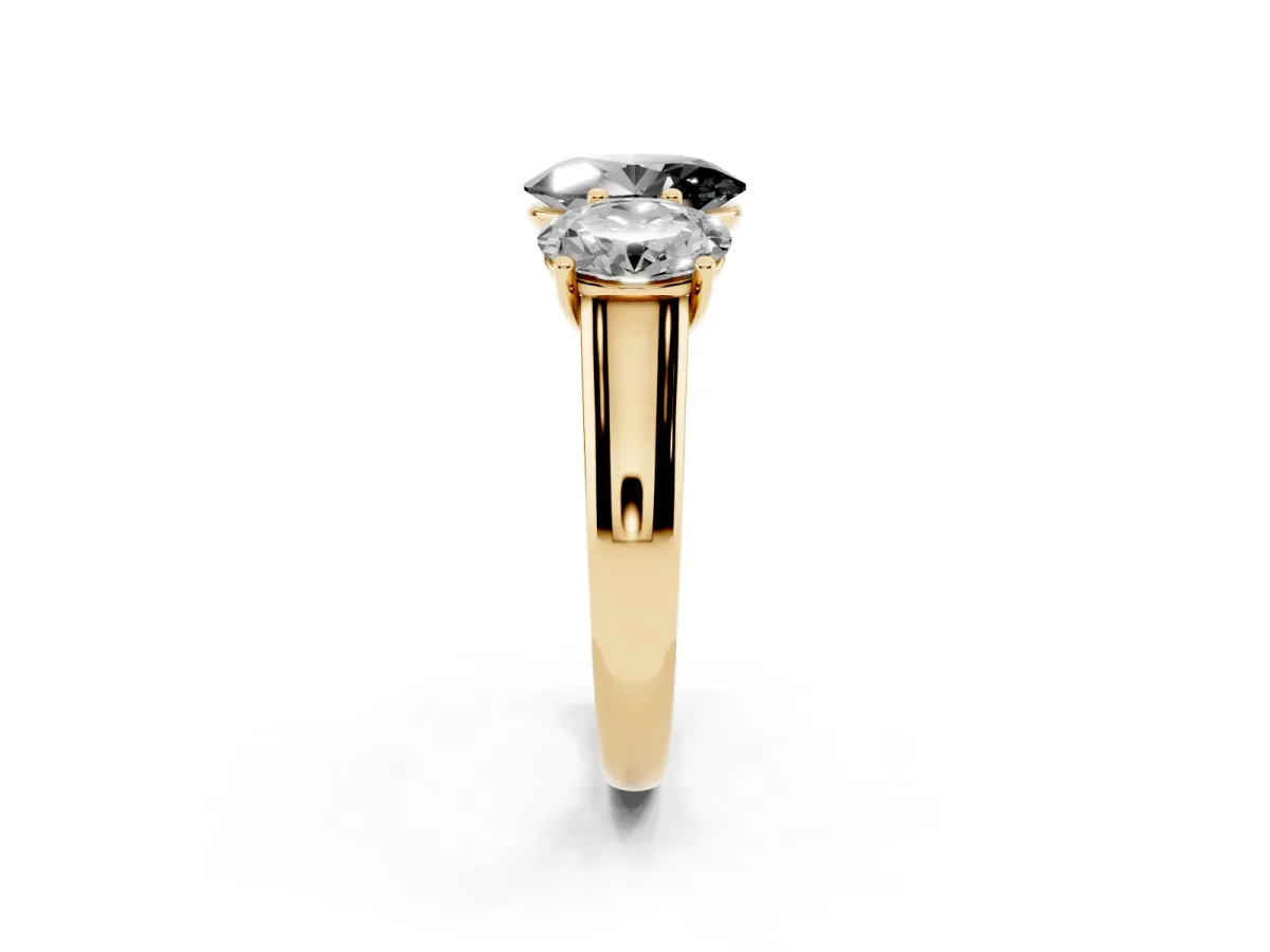 Fancy Black Oval Cut Three-Stone Diamond Ring with Prong Setting on a Classic Band Yellow gold