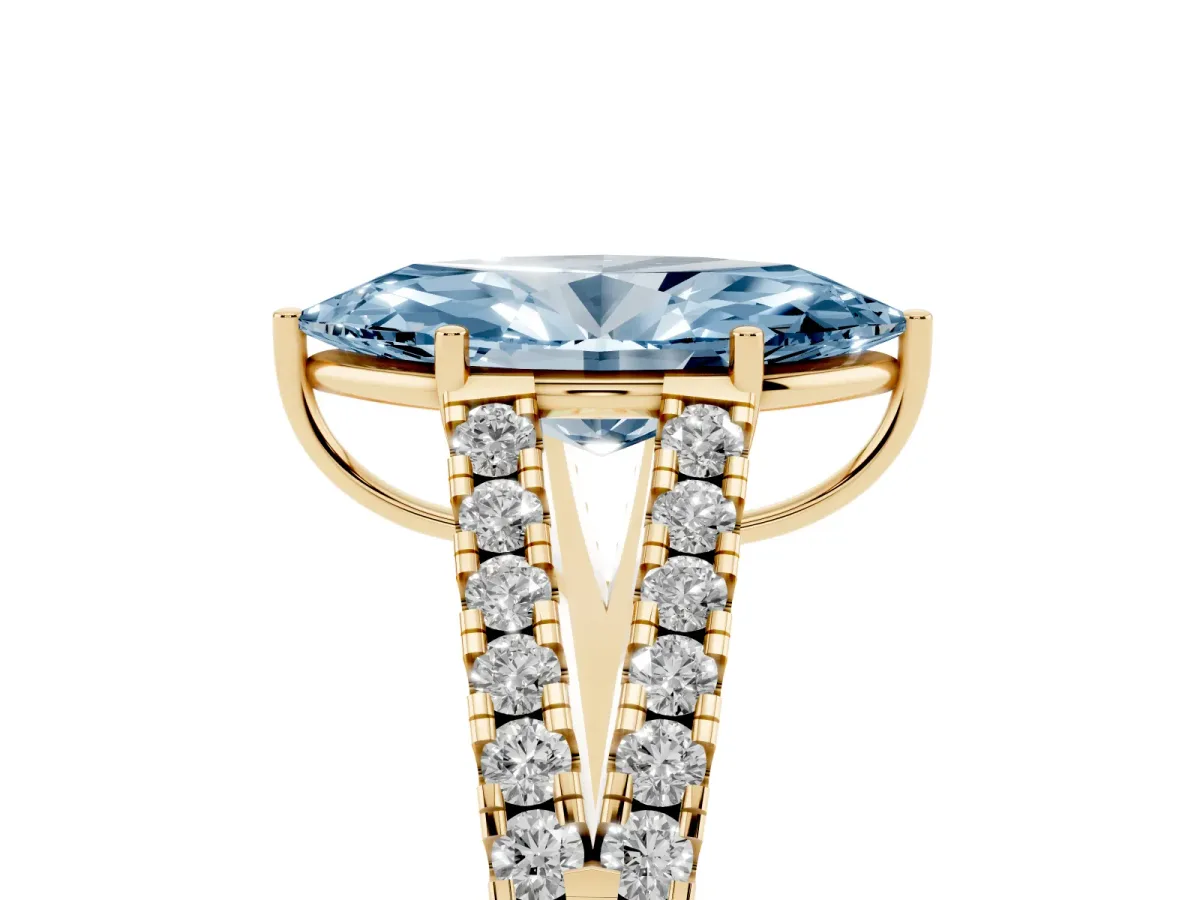 Fancy Blue Marquise Cut Diamond Split Shank Pavé Engagement Ring with Four-Prong Setting Yellow gold