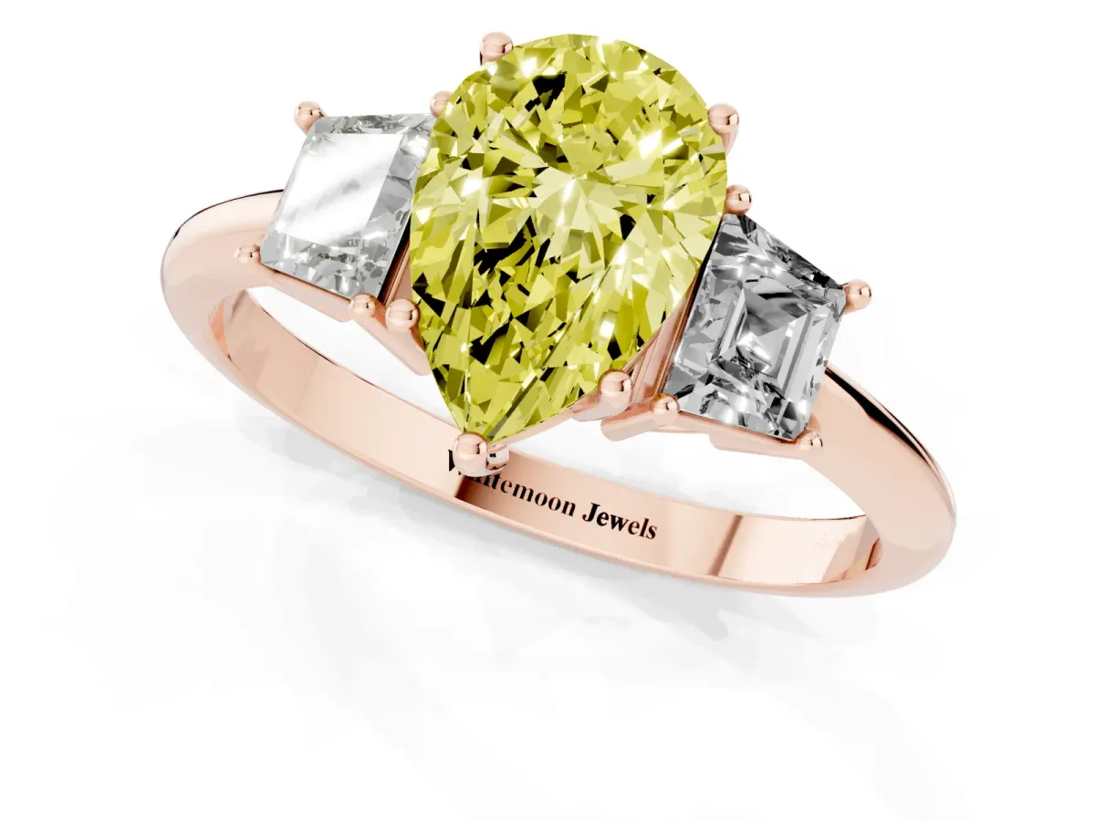 Fancy Yellow Pear Cut Diamond Three-Stone Ring with Trapezoid Side Stones and Prong Setting Rose gold