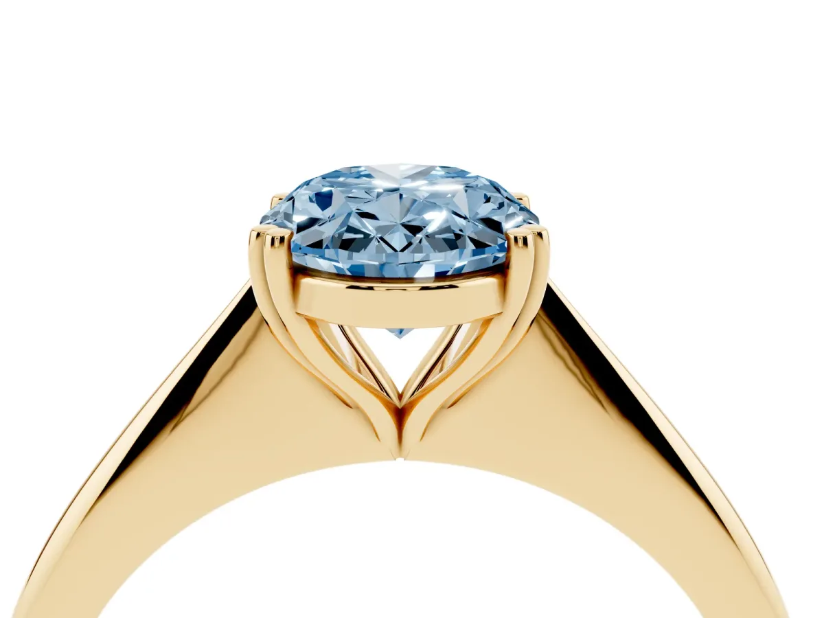 Fancy Blue Oval Cut Solitaire Diamond Ring with Six-Prong Setting and Classic Band Yellow gold