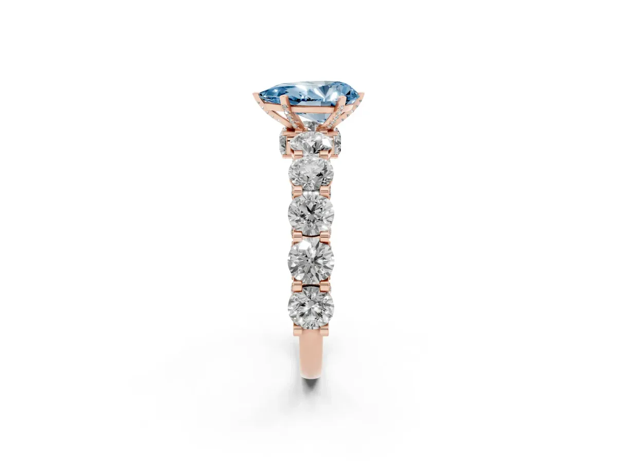 Fancy Blue Pear Cut Diamond Side Stone Engagement Ring with Four-Prong Setting Rose gold